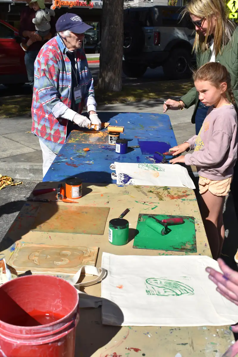 community members at outdoor art event