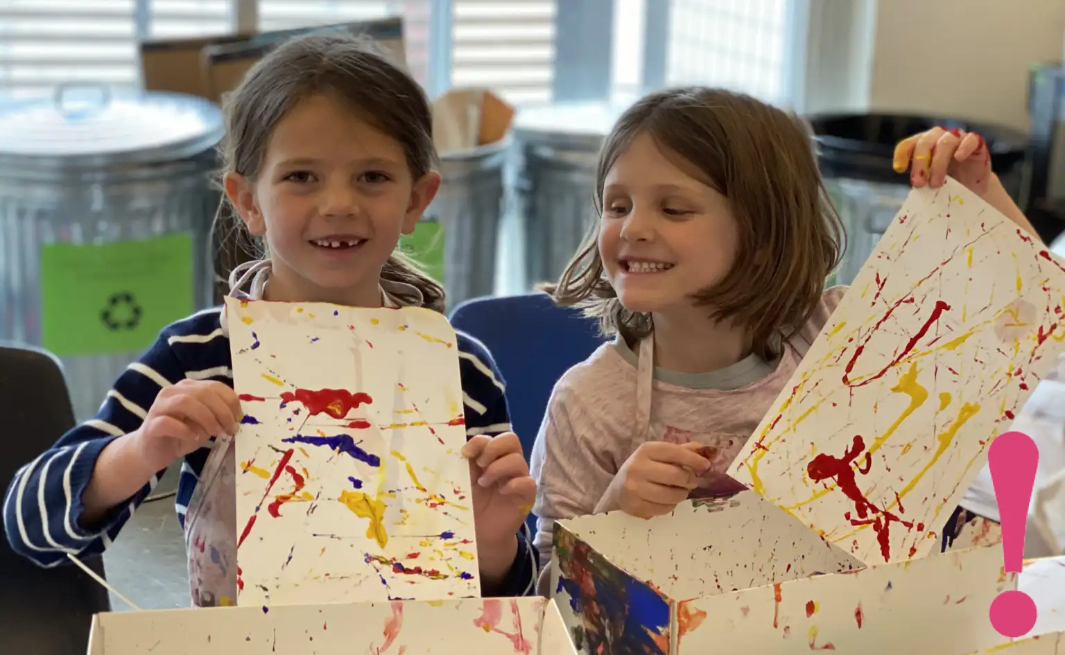 kids showing their artwork