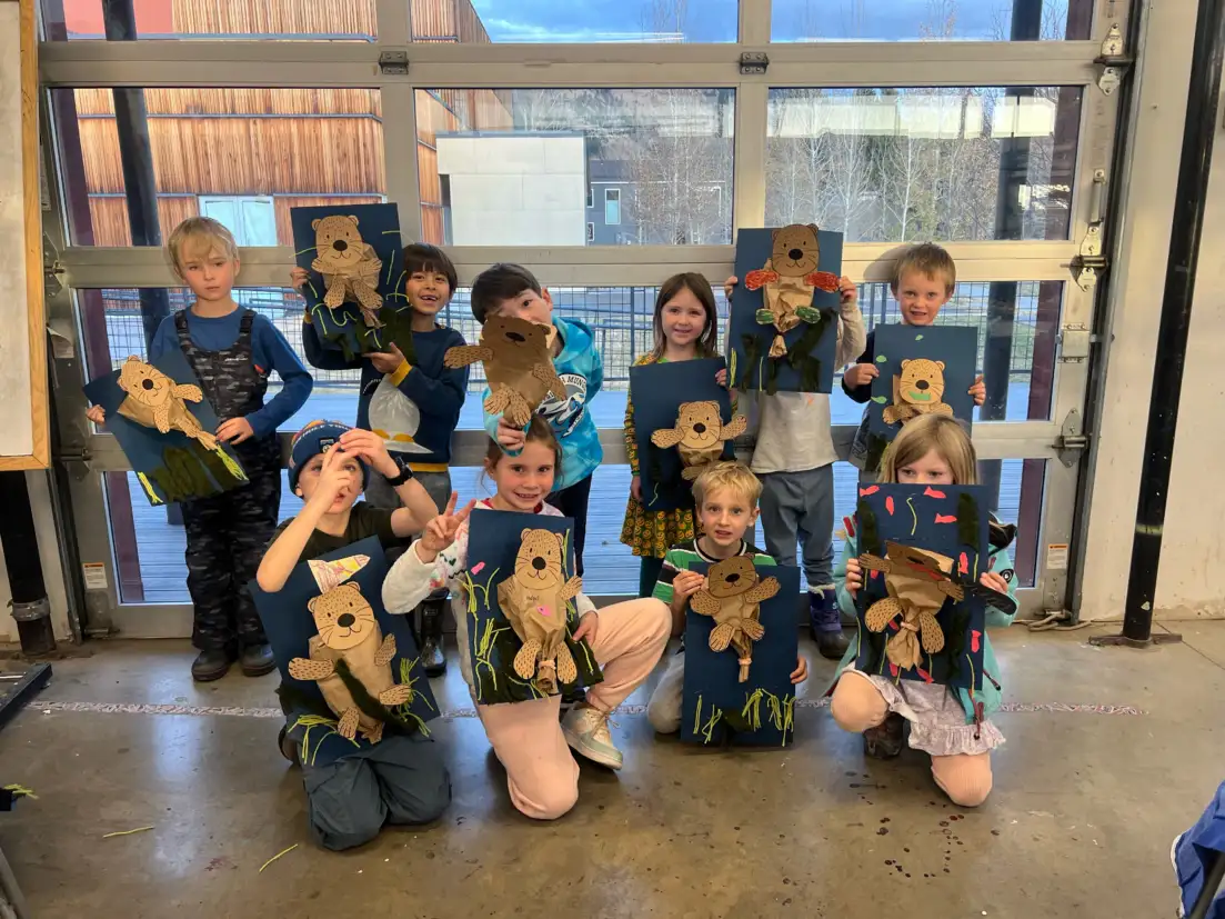 kids showing their artwork